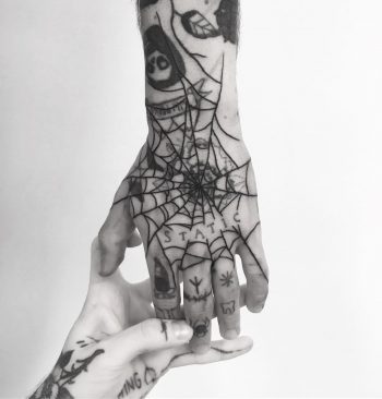 Black spider web hand by tattooist weepandforfeit