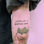 Capitalism is organised crime tattoo by Tristan Ritter