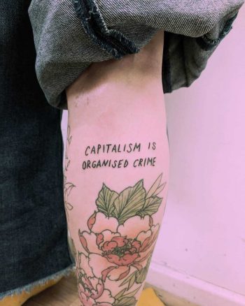 Capitalism is organised crime tattoo by Tristan Ritter