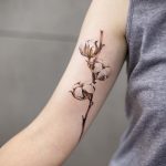 Cotton flower tattoo by tattooist Chenjie