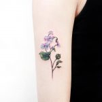 Cover-up flower by tattooist Ida