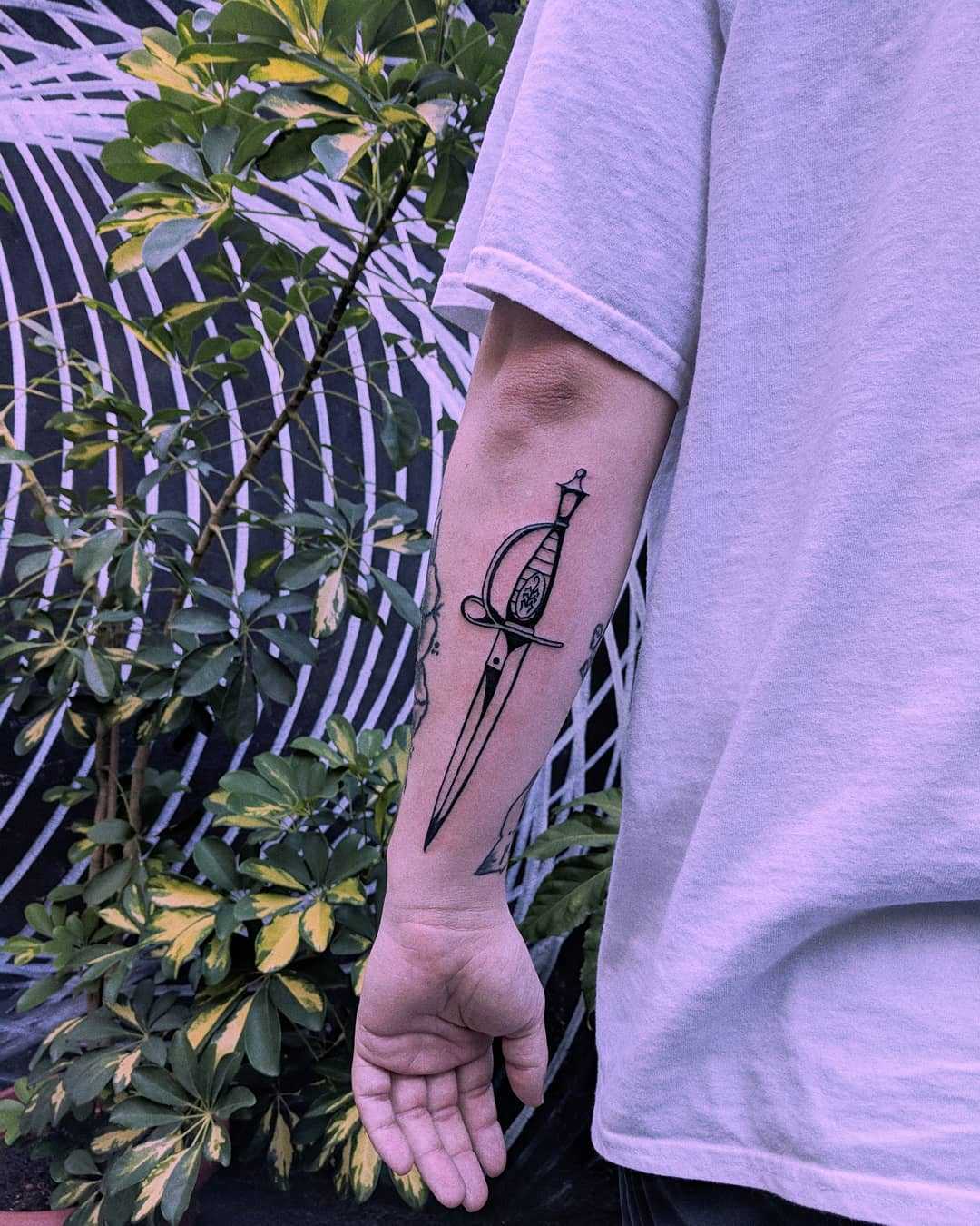 Dagger inked by Tristan Ritter