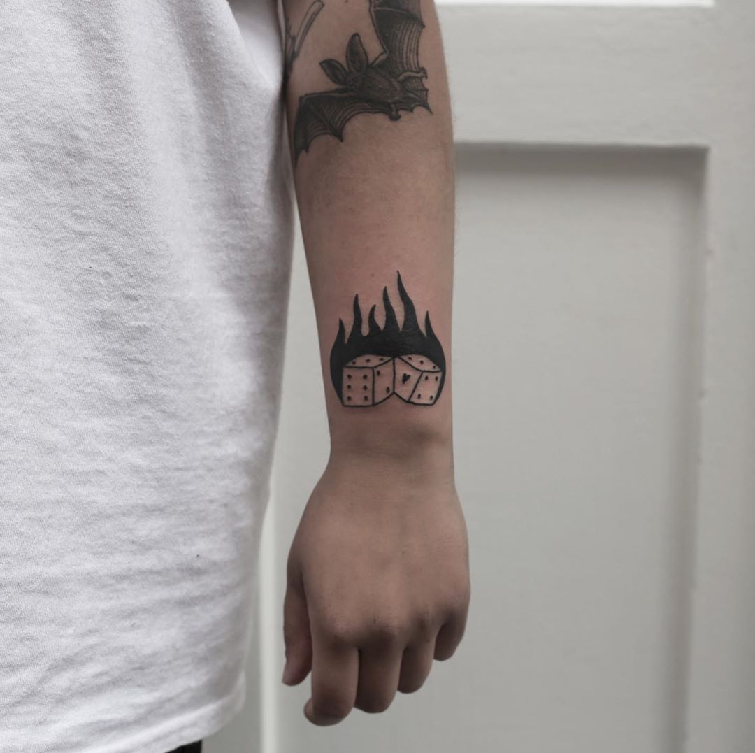 Flaming Dice tattoo by Rich Sinner