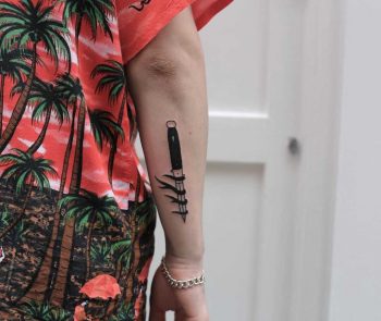 Flaming knife by Rich Sinner