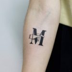 Letter M by tattooist Fury Art
