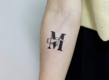 Letter M by tattooist Fury Art