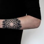 Mandala on the left forearm by tattooist NEENO