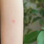 Micro heart by tattooist Franky