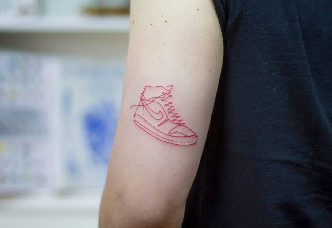 Nike sneaker tattoo by tattooist Fury Art