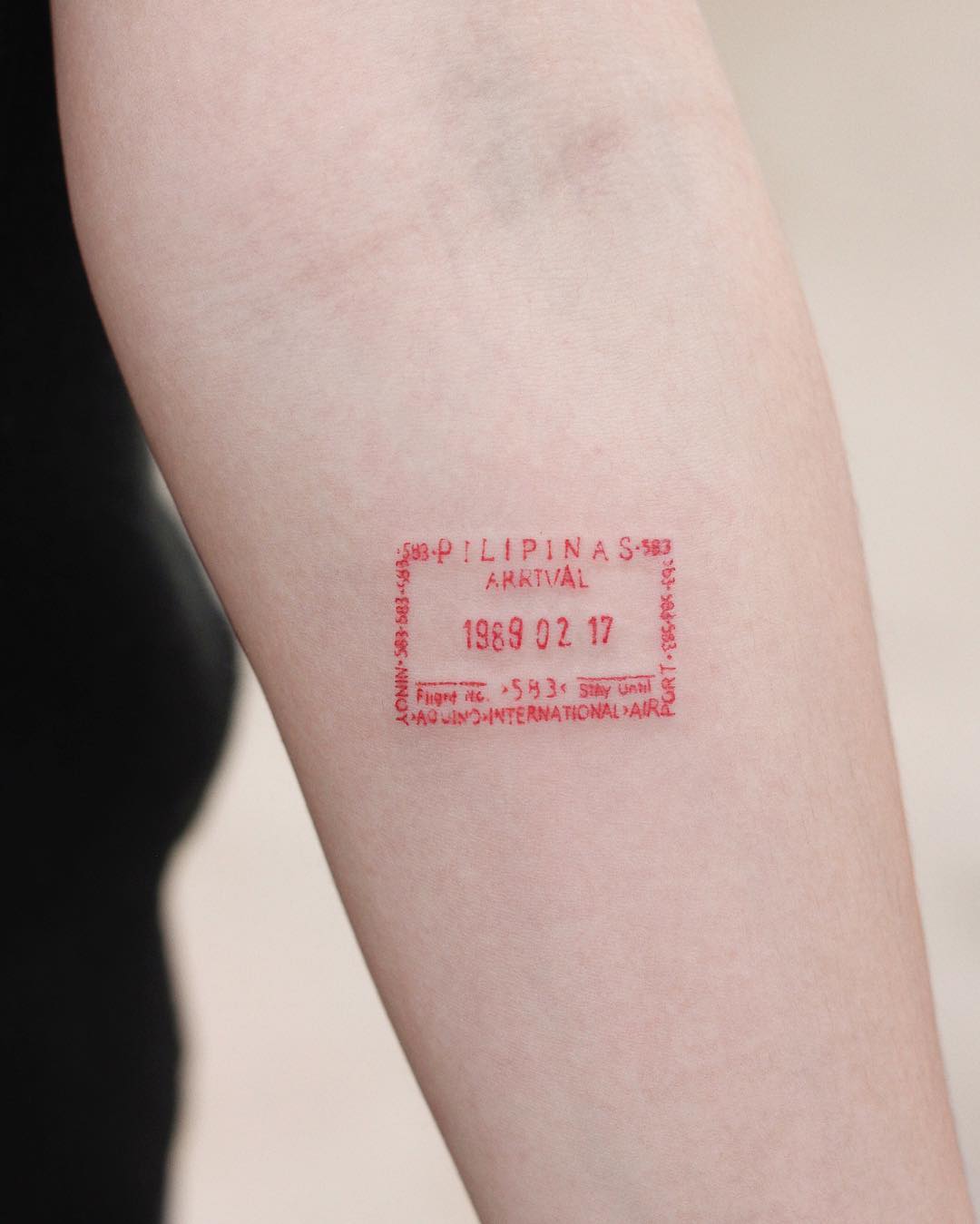 Passport stamp tattoo by tattooist Saegeem