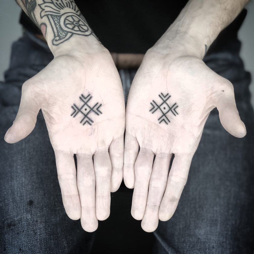Patterns on palms by tattooist MAIC