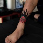 Rose on fire by tattooist Alejo GMZ