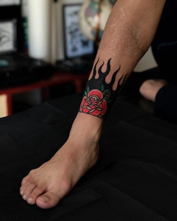 Rose on fire by tattooist Alejo GMZ