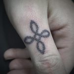 Tattoo on a knuckle by tattooist Virginia 108