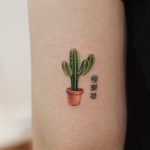 Tiny cactus by tattooist Saegeem