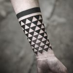 Triangular pattern by tattooist MAIC