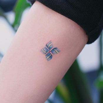 Wayne Thiebaud's Three Wind Toys tattoo by tattooist Saegeem