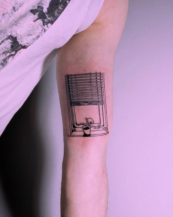 Window and plant by Tristan Ritter