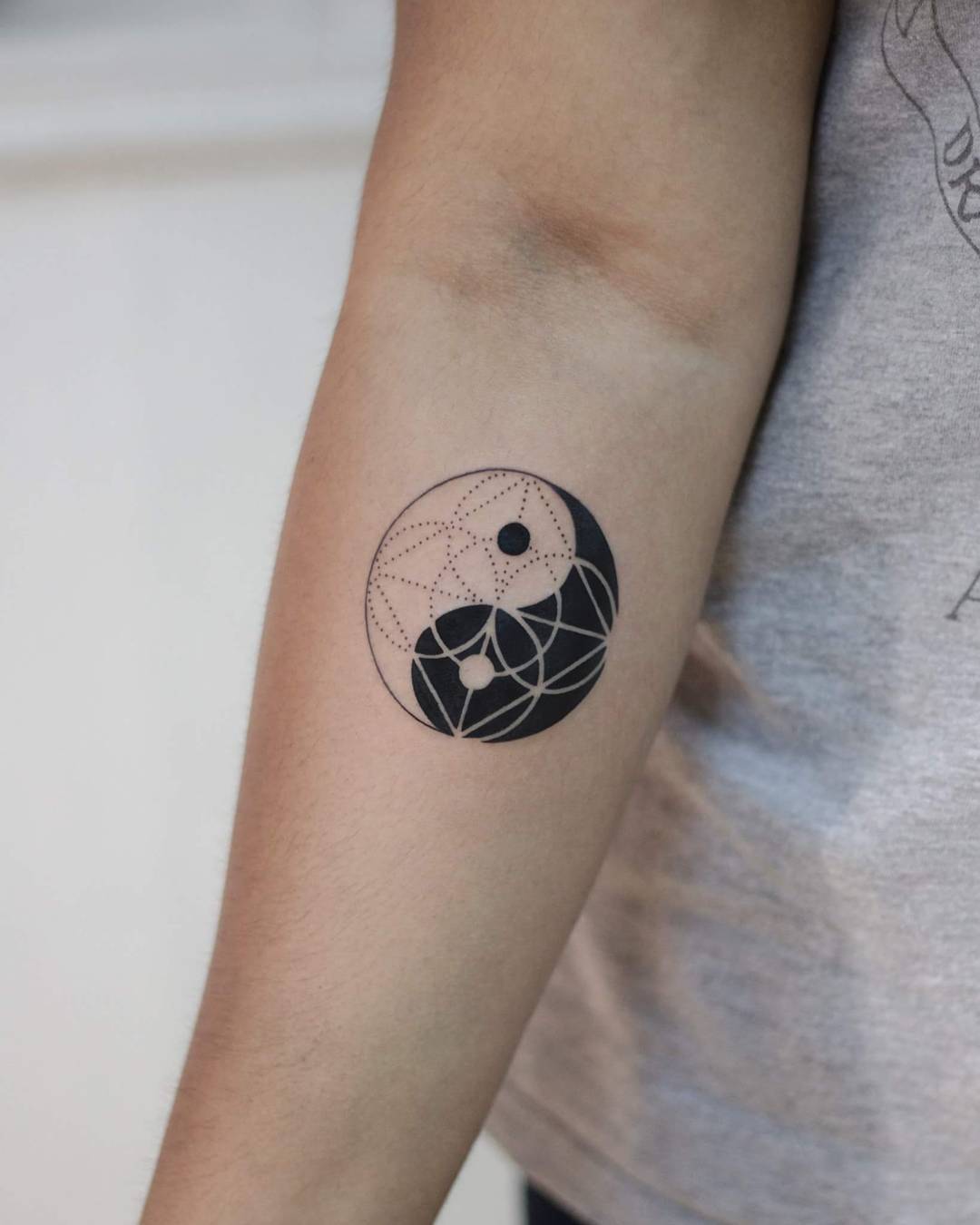 Yin and yang by tattooist Fury Art