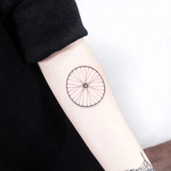 Bicycle wheel tattoo by tattooist Ida