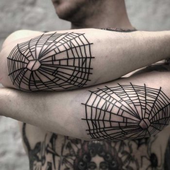 Elbow webs by tattooist MAIC