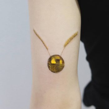 Golden Snitch tattoo by Hakan Adik