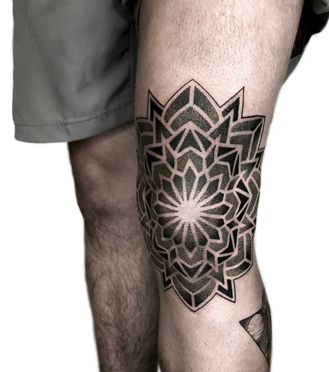 Dot-work knee mandala by tattooist Neeno
