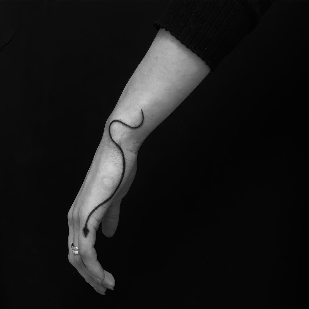 Minimalist thin snake by Marco Sorgato - Tattoogrid.net