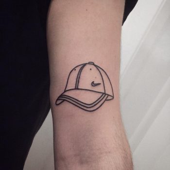 Nike cap tattoo by @themagicrosa