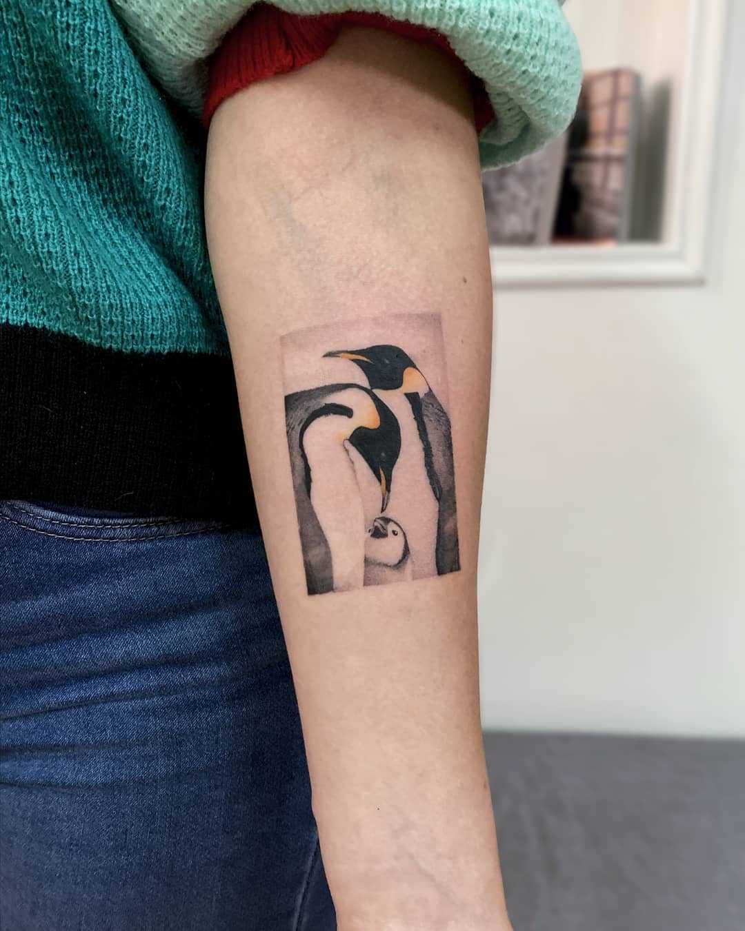 Penguin family by tattooist Fury Art