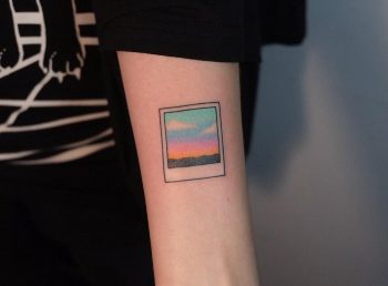 Polaroid photo tattoo by Yaroslav Putyata