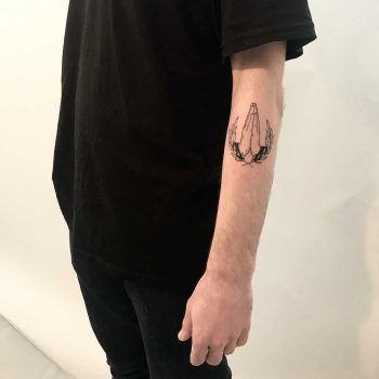 Praying hands by Sara Kori