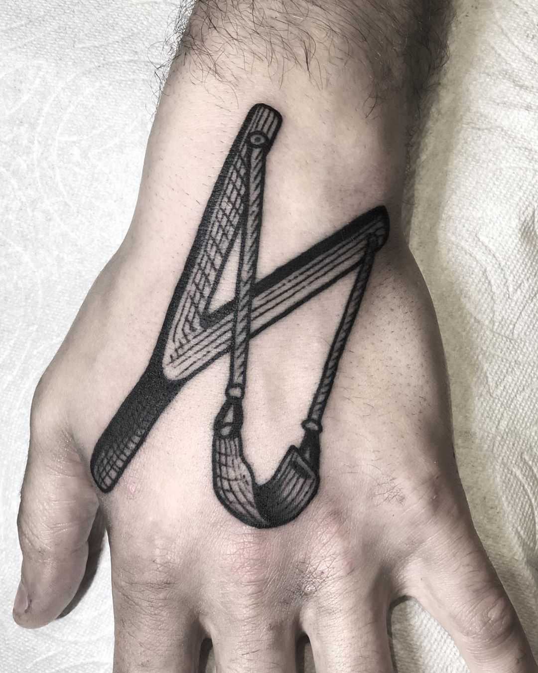 Sling shot by tattooist MAIC