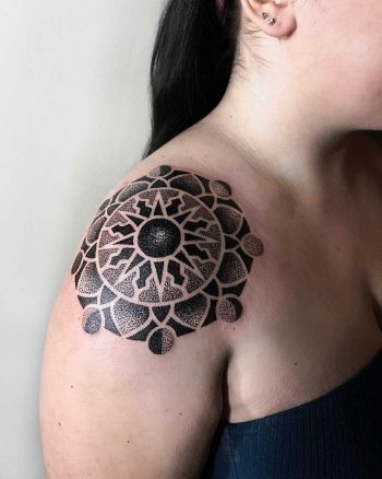Sun and moon phase inspired mandala by tattooist NEENO