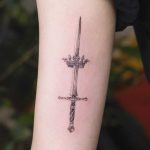 Sword and crown by tattooist Franky
