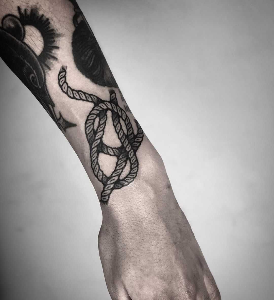 Tied rope by tattooist MAIC