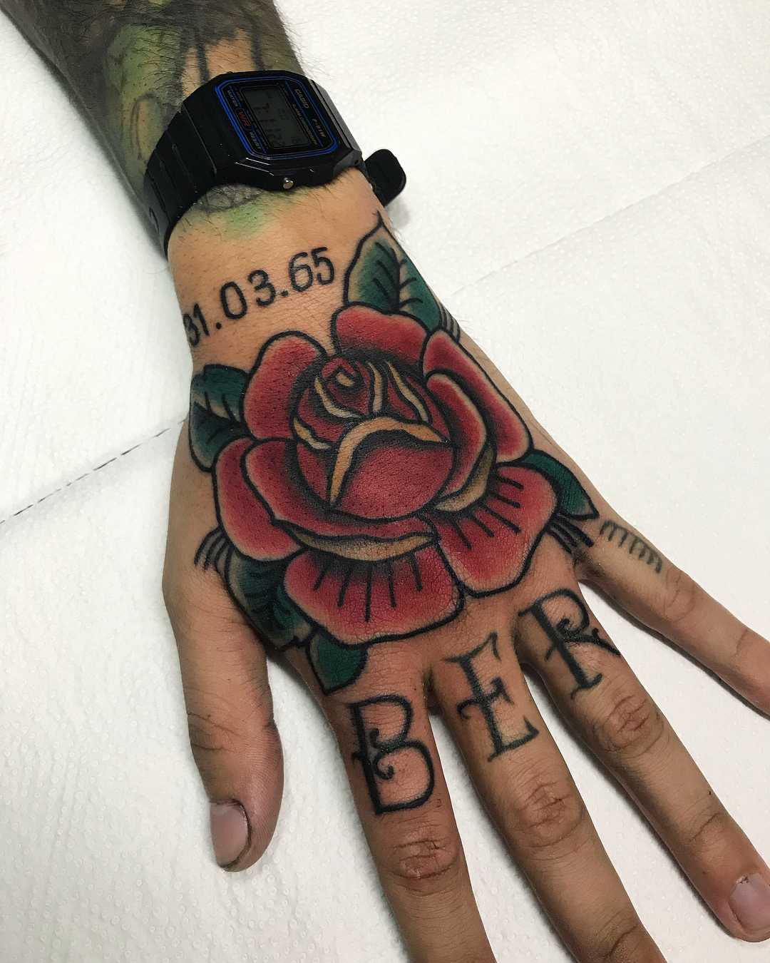 Traditional rose on a hand by rocotatt