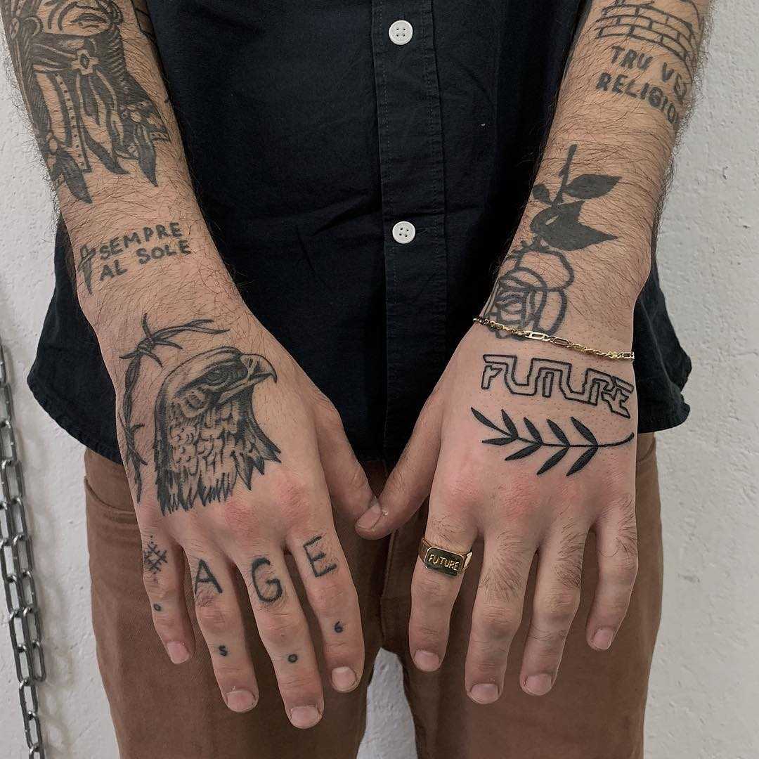 Various black tats by @ylitenzo
