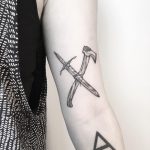 Ax and short sword by @mariafernandeztattoo