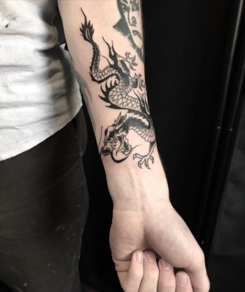 Dragon by @lonewolftattoo