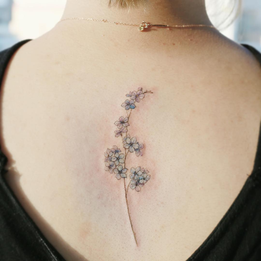 Flower on the back by @tattooist_flower