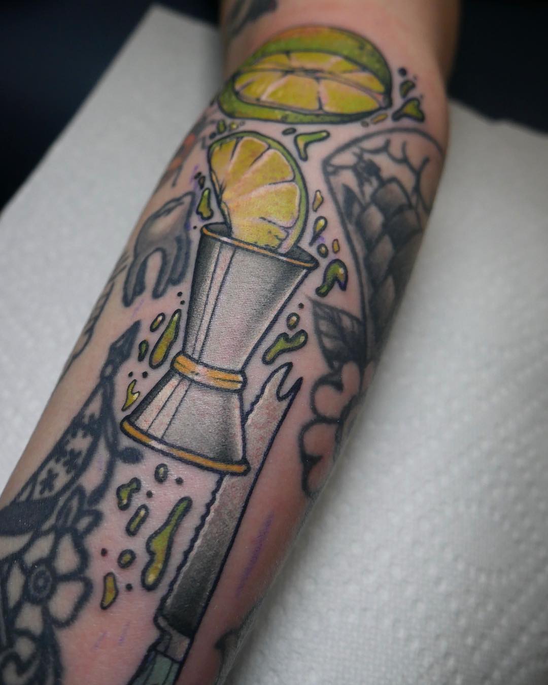 Limes and jigger tattoo by @patcrump