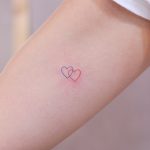 Linked hearts by @wittybutton_tattoo