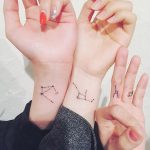 Matching constellations by @wittybutton_tattoo