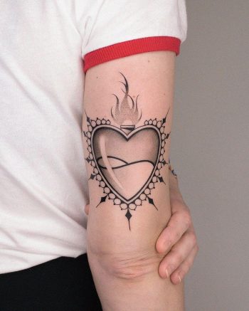 Another sacred heart by @xavtattoo