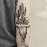 Cacti and bull skull by @justinoliviertattoo