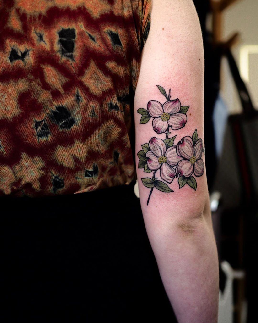 Dogwood flowers tattoo by @sophiabaughan