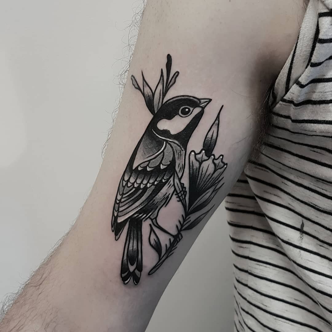 Little grey and black tit on a flower by @rabtattoo