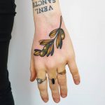 Olive branch on hand by @rabtattoo