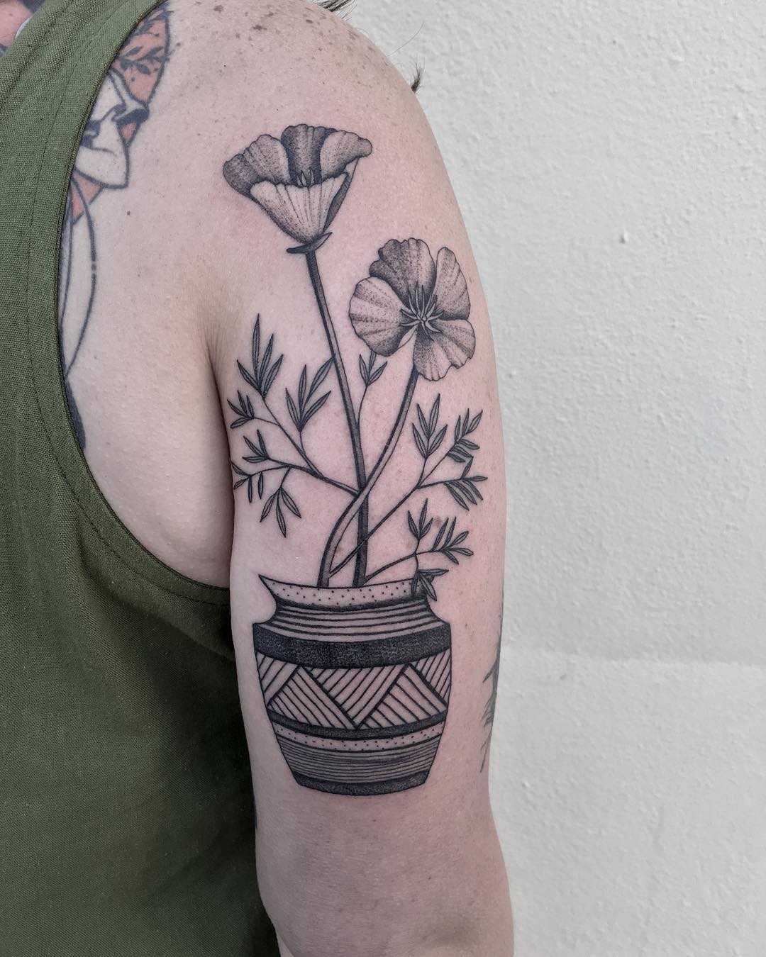 Poppies in a pot by @justinoliviertattoo